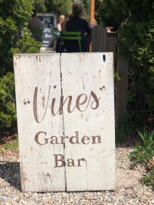 the brown Jug Vines garden bar