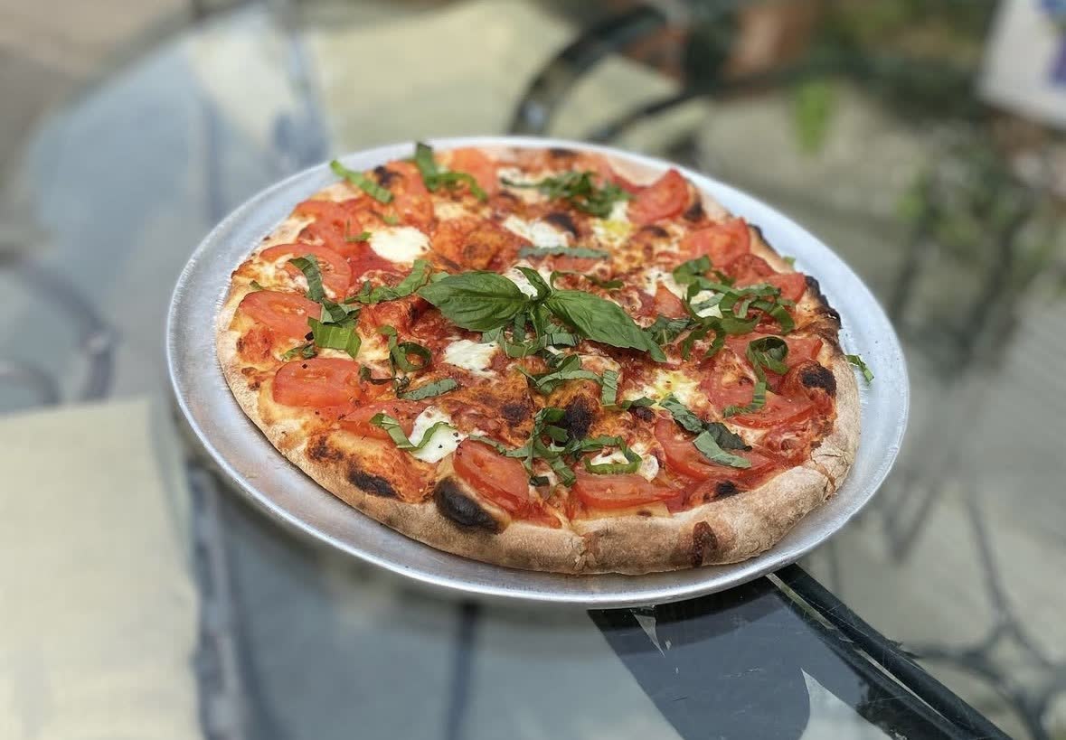 Relax Home Page-crop-optimized Pizza with basil topping at The Brown Jug
